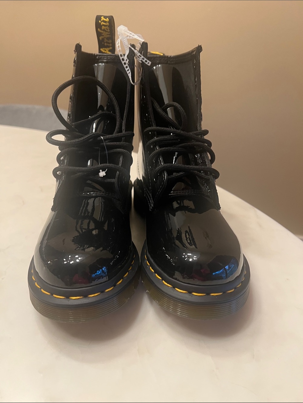 Dr. Martens Black Patent Lace-Up Boots with Yellow Stitching